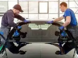 New windshield getting installed